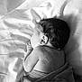 Alivia joined the competition — help win amazing prizes! baby, newborn, sleeping, black_and_white, blanket, curly_hair, infant, soft_texture, bed, wrinkled_sheet, peaceful, close_up, portrait, skin, head, ear, hand, resting, quiet, calm