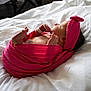Alivia is registered to the contest to win money with this photo: newborn, baby, sleeping, pink_blanket, headband, bed, white_bedding, infant, wrapped, resting, peaceful, soft, cute, tiny_hands, tiny_feet, indoors, portrait, closeup, cozy, sleep