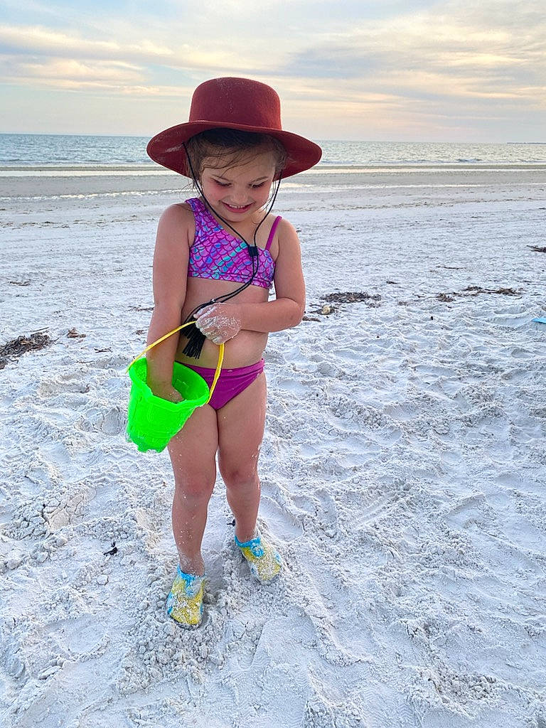 Amora joined the competition — help win amazing prizes! beach, cloud, eyewear, fun, happy, hat, headgear, human_leg, joy, landscape, leisure, people_in_nature, people_on_beach, person, sand, sky, smile, summer, sun_hat, thigh