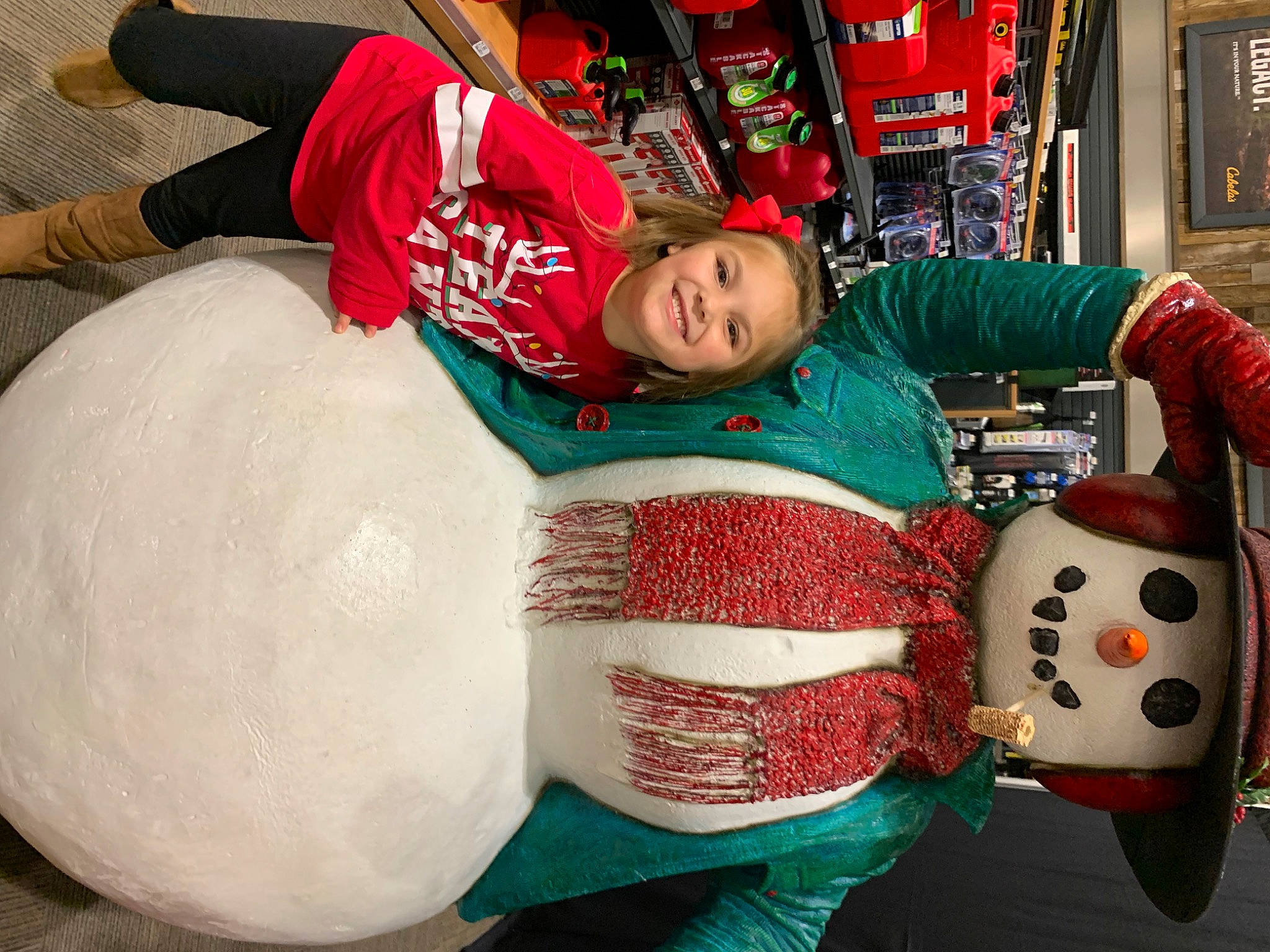 Amora joined the competition — help win amazing prizes! bean_bag, child, christmas, christmas_decoration, christmas_eve, christmas_ornament, event, facial_expression, fun, happy, headgear, holiday, joy, person, recreation, red, shelf, textile, toddler, tradition