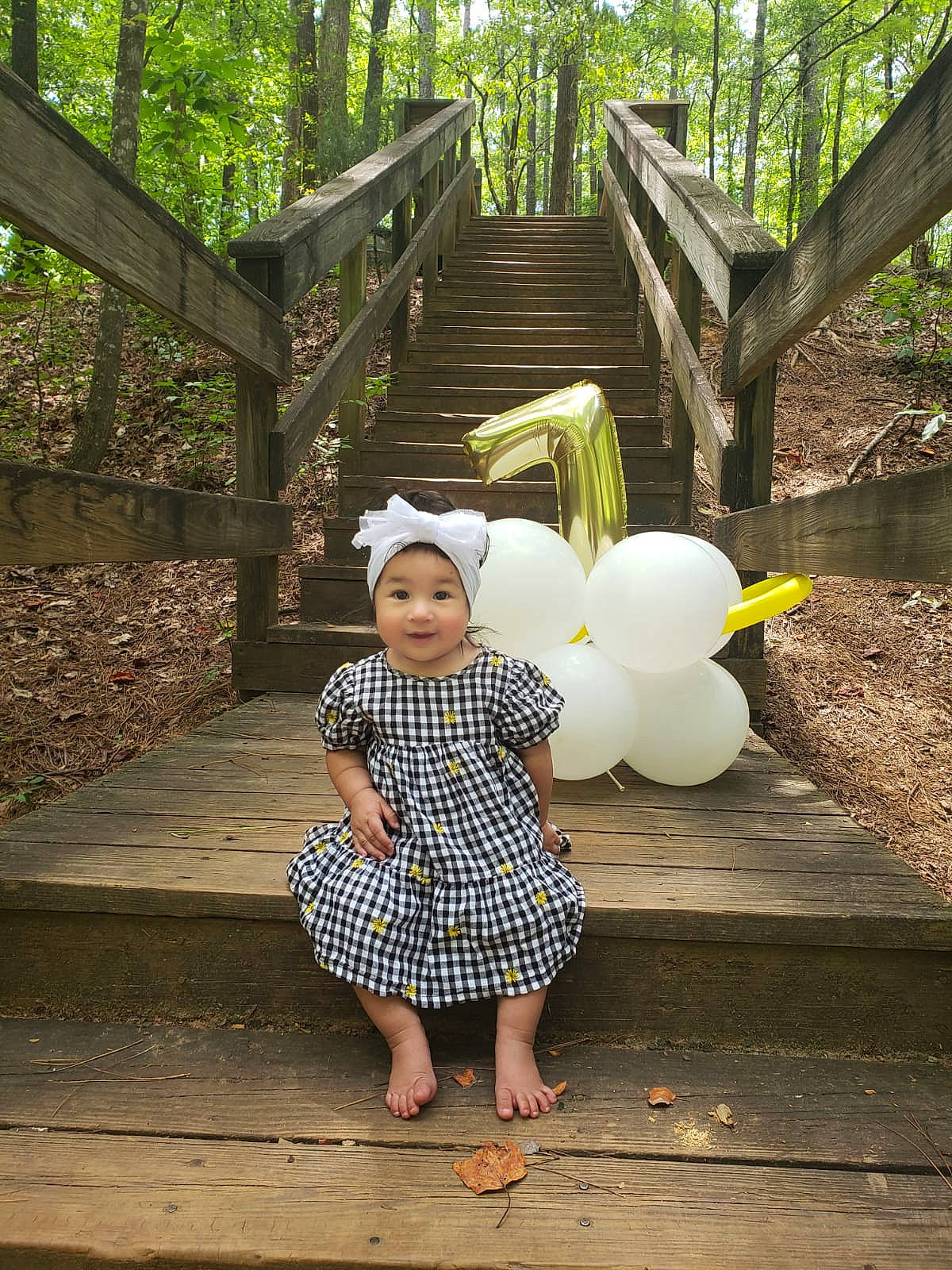 Elle joined the competition — help win amazing prizes! botany, child, day_dress, dress, fun, grass, green, happy, headwear, leisure, mammal, one_piece_garment, pattern, people_in_nature, person, plant, sunlight, toddler, toy, tree