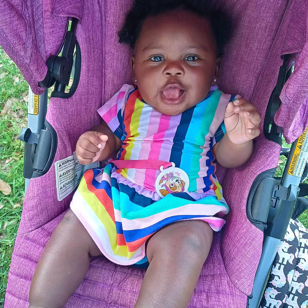 Ja'Siah Broussard is registered to the contest to win money with this photo: baby, baby_carriage, baby_products, baby_toddler_clothing, car_seat, cheek, child, comfort, finger, hand, happy, iris, leg, magenta, person, pink, purple, sitting, skin, thumb