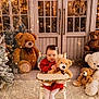 Ella Rose is registered to the contest to win money with this photo: toddler, child, red_dress, high_chair, teddy_bear, plush_toy, christmas_tree, decorations, festive, cozy, carpet, indoor, holiday, smiling, cute, winter, white_tights, wreath, window, vintage_furniture