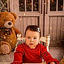 Ella Rose is registered to the contest to win money with this photo: child, toddler, red_dress, white_bow, blue_eyes, sitting, wooden_chair, teddy_bear, stuffed_animal, winter_decor, festive, indoors, portrait, cute, holiday, sparkles, cozy, decor, curious, face