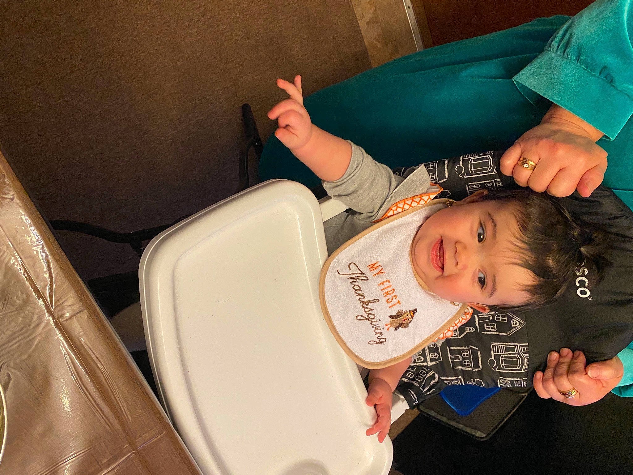 Alexandria is registered to the contest to win money with this photo: chair, child, comfort, elbow, finger, fun, hairstyle, happy, laugh, person, play, room, sitting, sleeve, smile, t_shirt, thumb, toddler, vacation, vehicle_door