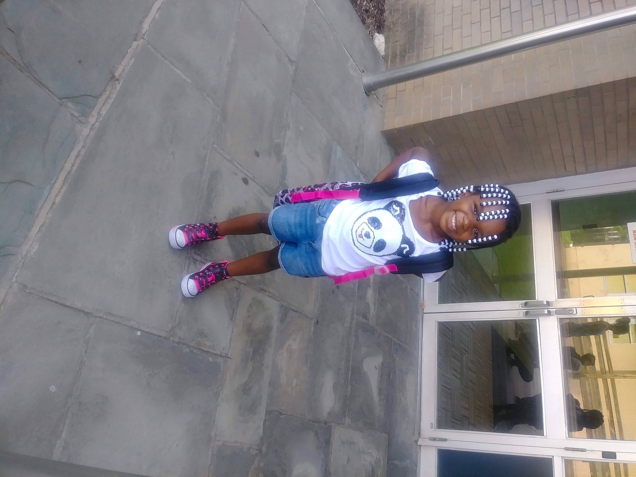 Iyanna joined the competition — help win amazing prizes! ankle, building, carmine, concrete, electric_blue, hat, human_leg, joy, knee, magenta, outdoor_shoe, person, recreation, shorts, sock, sports_uniform, sportswear, street_fashion, t_shirt, thigh