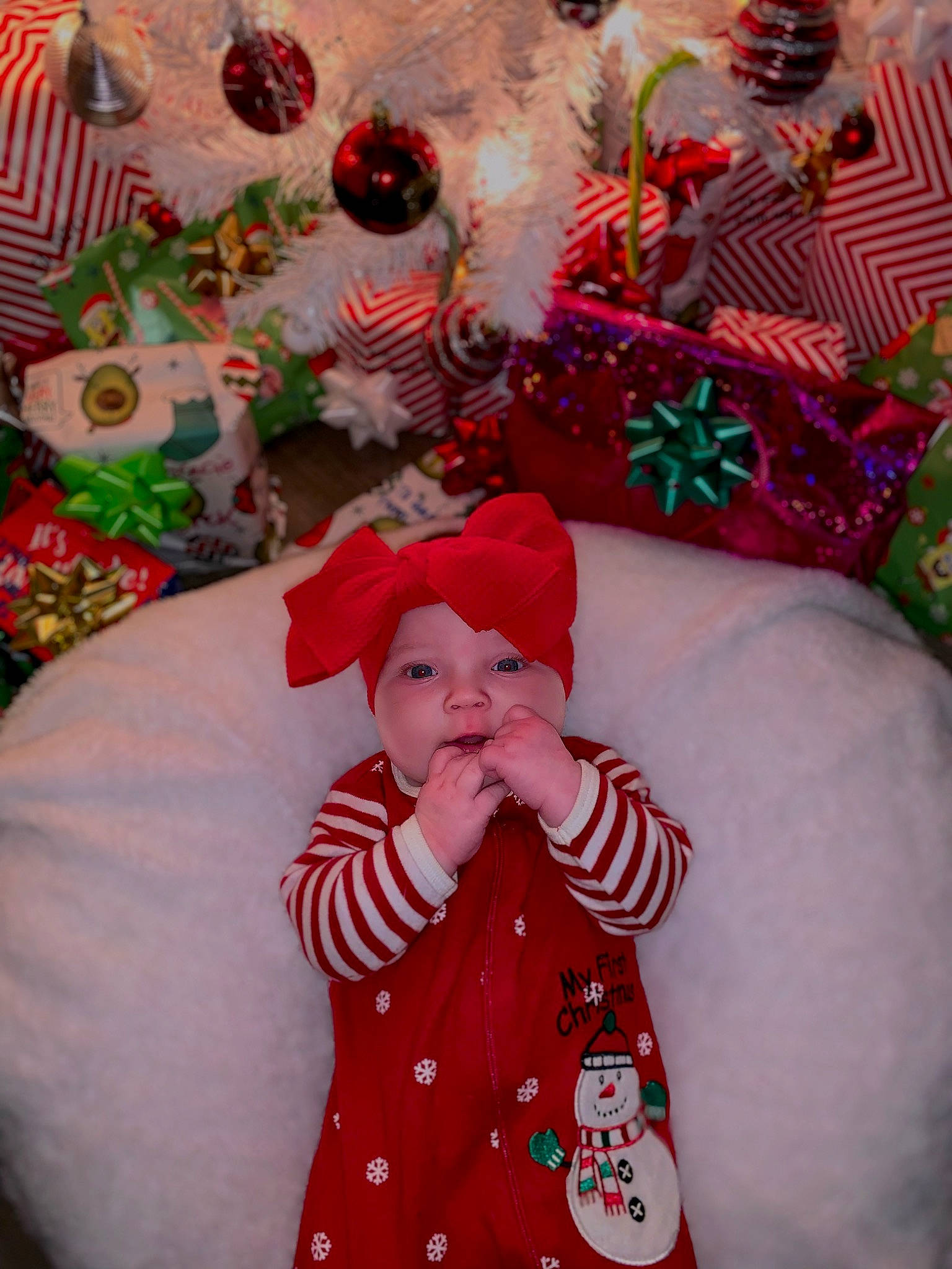 Remi joined the competition — help win amazing prizes! baby, baby_toddler_clothing, child, christmas, christmas_decoration, christmas_eve, costume_hat, event, fun, happy, hat, headgear, headwear, holiday, magenta, pattern, person, pink, santa_claus, sleeve