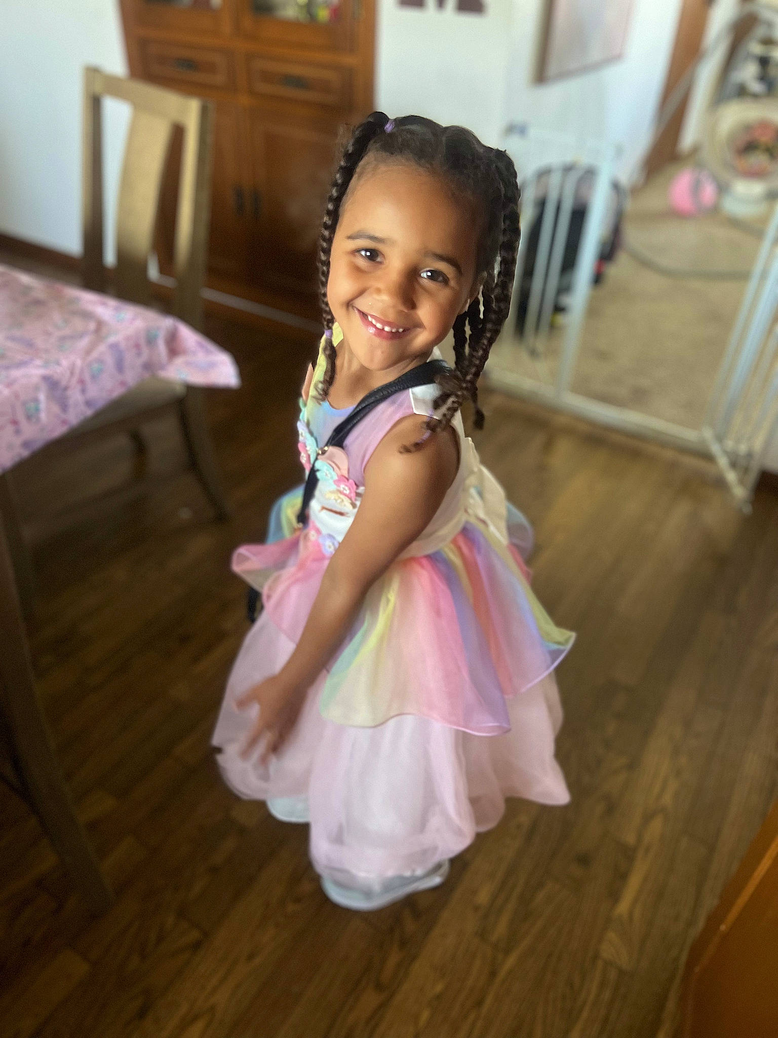 Akiyah joined the competition — help win amazing prizes! baby_toddler_clothing, chair, dress, event, face, fashion_design, flash_photography, floor, flooring, formal_wear, happy, hardwood, iris, joy, laminate_flooring, magenta, person, sitting, smile, toddler
