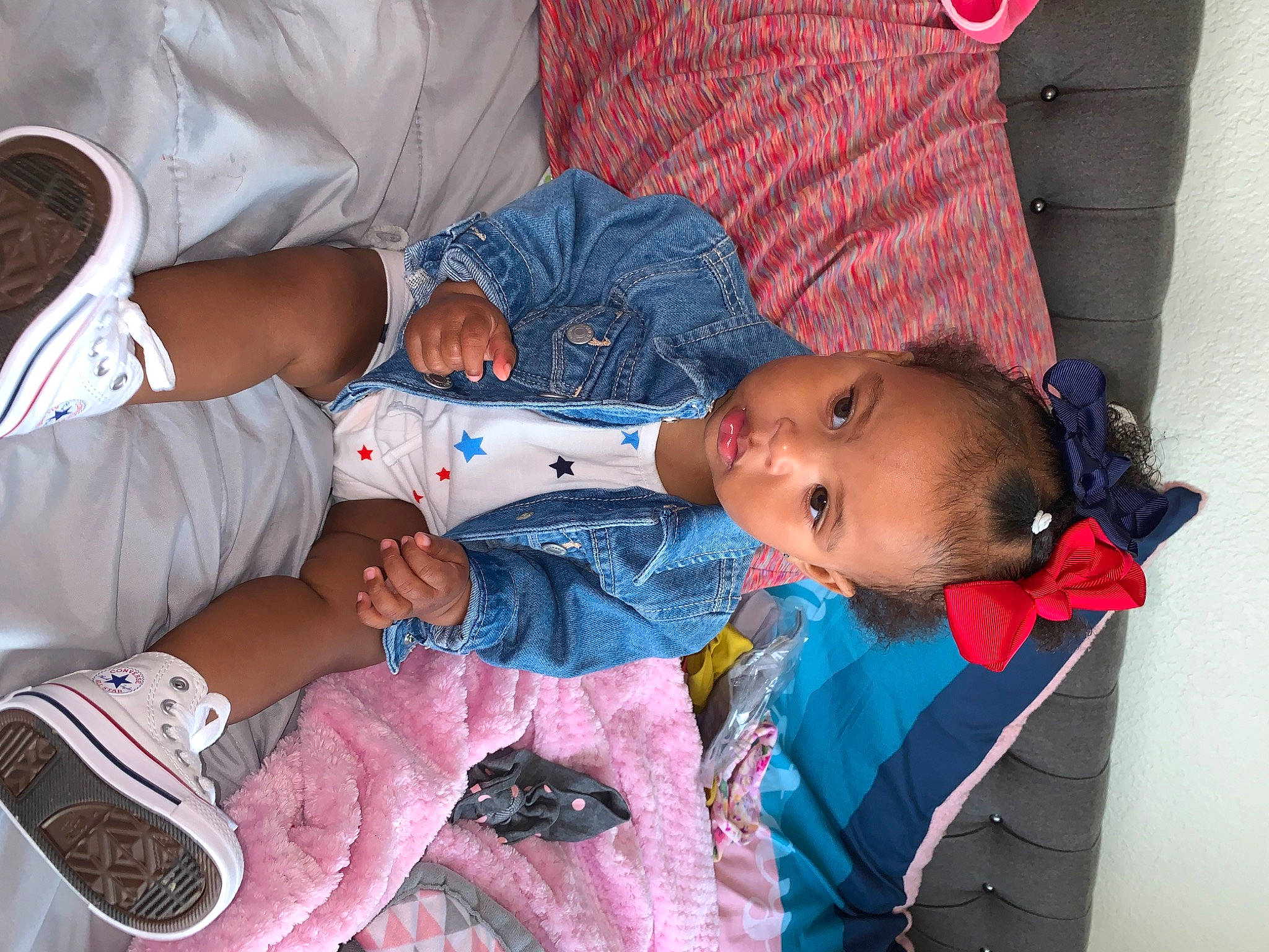 Elani joined the competition — help win amazing prizes! baby, baby_products, baby_toddler_clothing, cheek, child, comfort, finger, hand, hat, head, human_body, lap, mouth, person, product, red, sitting, sleeve, textile, toddler