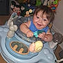 Ezequiel is registered to the contest to win money with this photo: baby, child, toy, walker, mickey_mouse, smiling, indoor, blue_clothing, happy, face, hand, plastic_toy, floor, wooden_floor, playtime, cute, infant, background, person, young_child