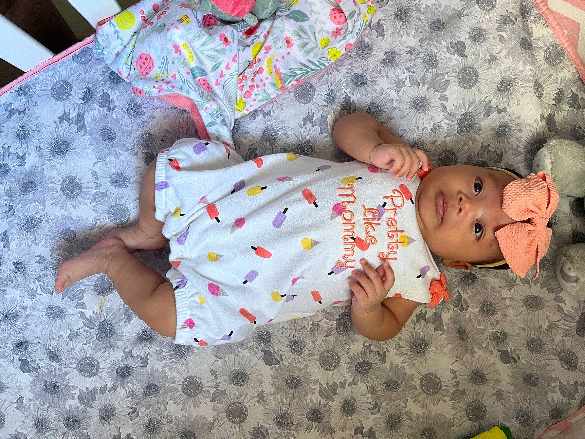 Haiden joined the competition — help win amazing prizes! arm, baby, baby_products, baby_safety, baby_sleeping, baby_toddler_clothing, baby_toys, bedding, child, comfort, dress, hand, headwear, human_body, linens, nightwear, pattern, person, room, sleeve