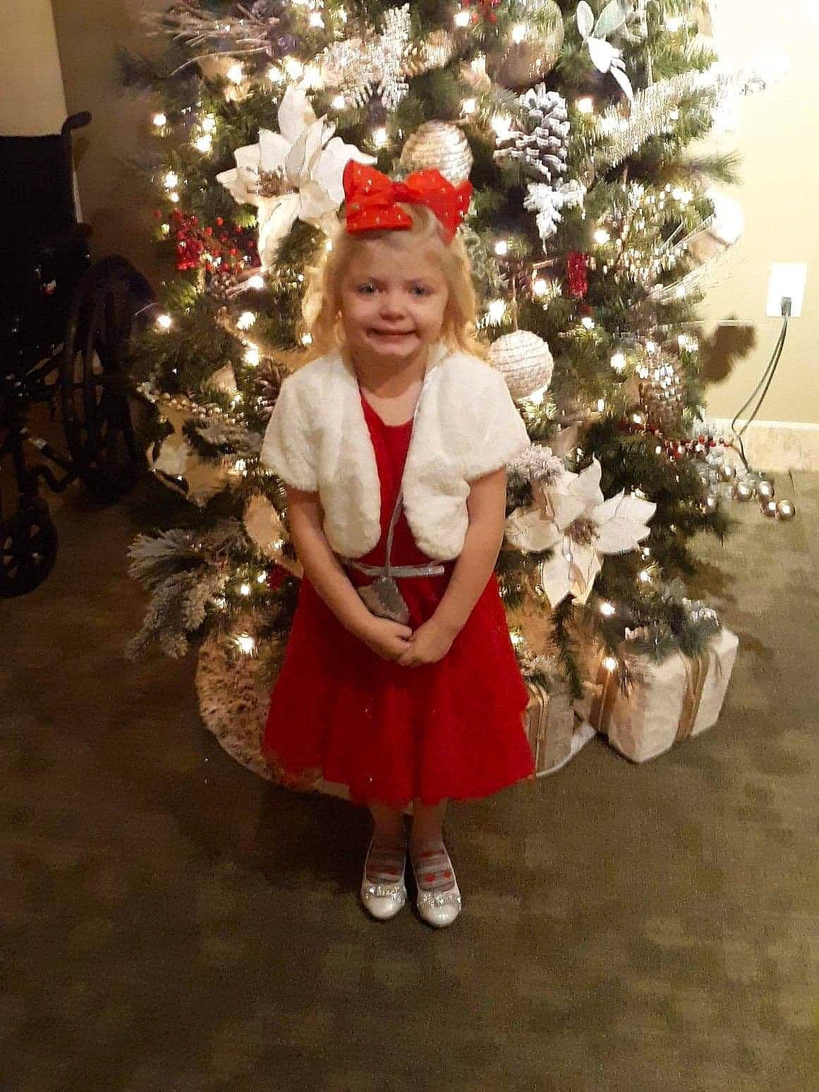 Aveyanah is registered to the contest to win money with this photo: christmas, christmas_decoration, christmas_eve, christmas_lights, christmas_ornament, christmas_tree, conifer, event, evergreen, facial_expression, happy, head, holiday, holiday_ornament, human_body, joy, ornament, person, smile, toddler