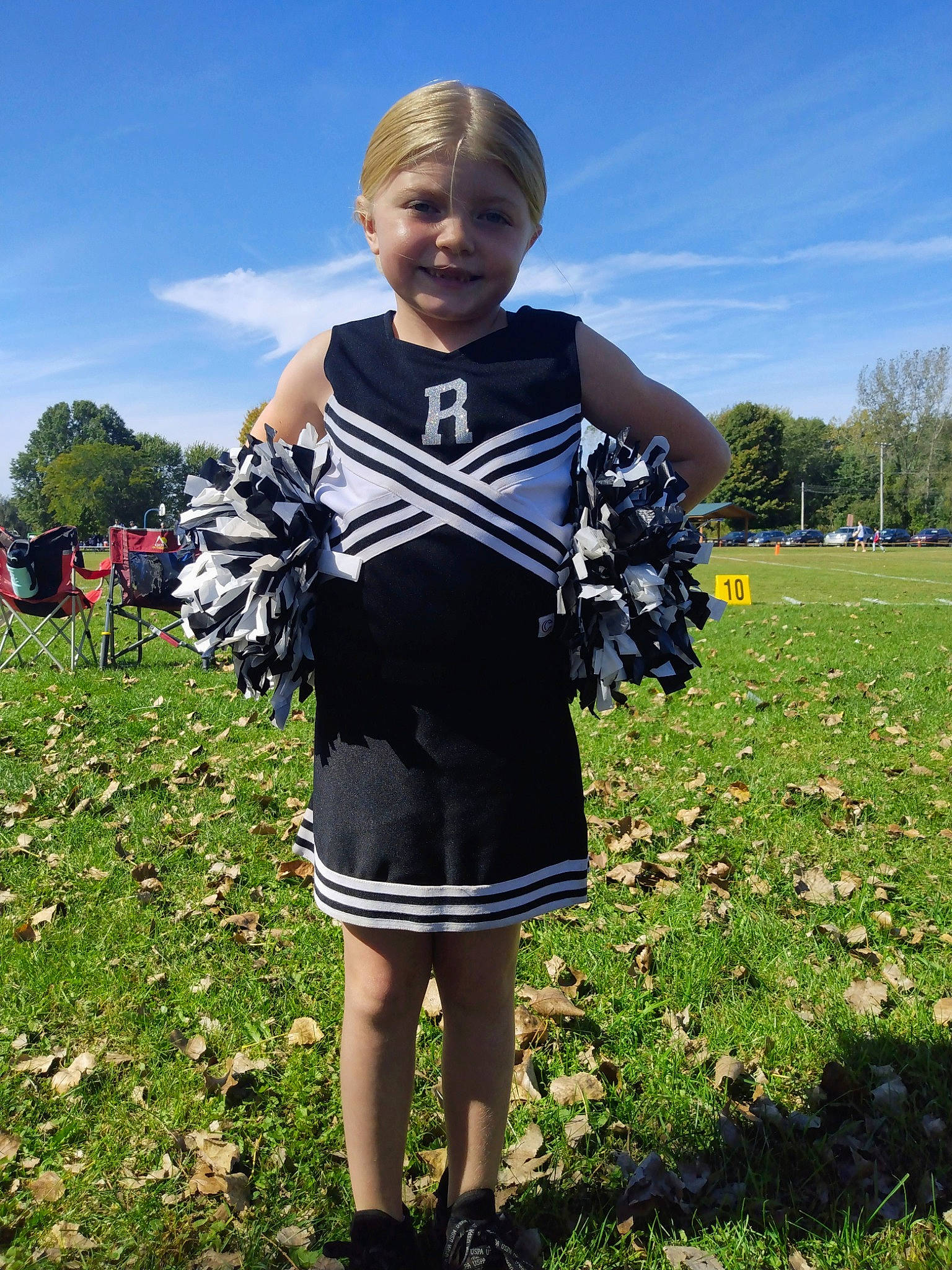 Aveyanah is registered to the contest to win money with this photo: cloud, day_dress, dress, electric_blue, fun, grass, grassland, happy, joy, lawn, meadow, pattern, people_in_nature, person, personal_protective_equipment, plant, sky, sleeve, t_shirt, toddler