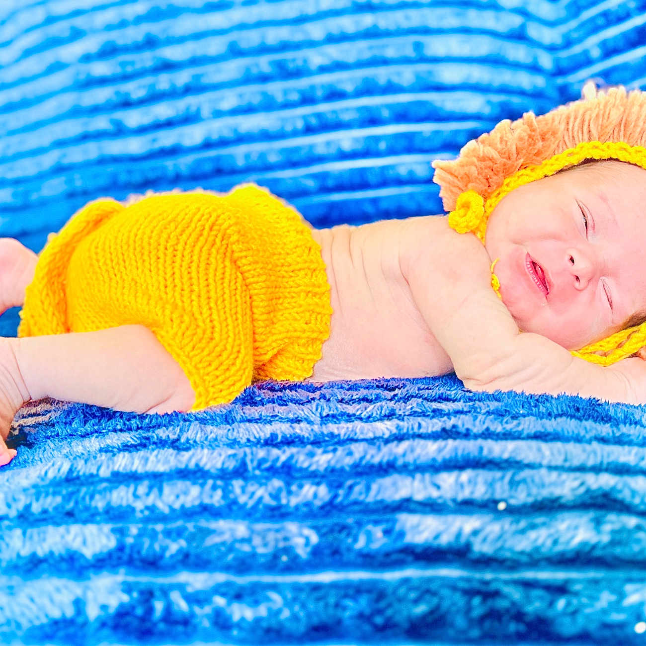 Ethan joined the competition — help win amazing prizes! baby, blanket, bodypart, bonnet, cap, clothing, face, finger, glove, hand, happy, hat, head, newborn, person, photography, portrait, sleeping, smile, towel