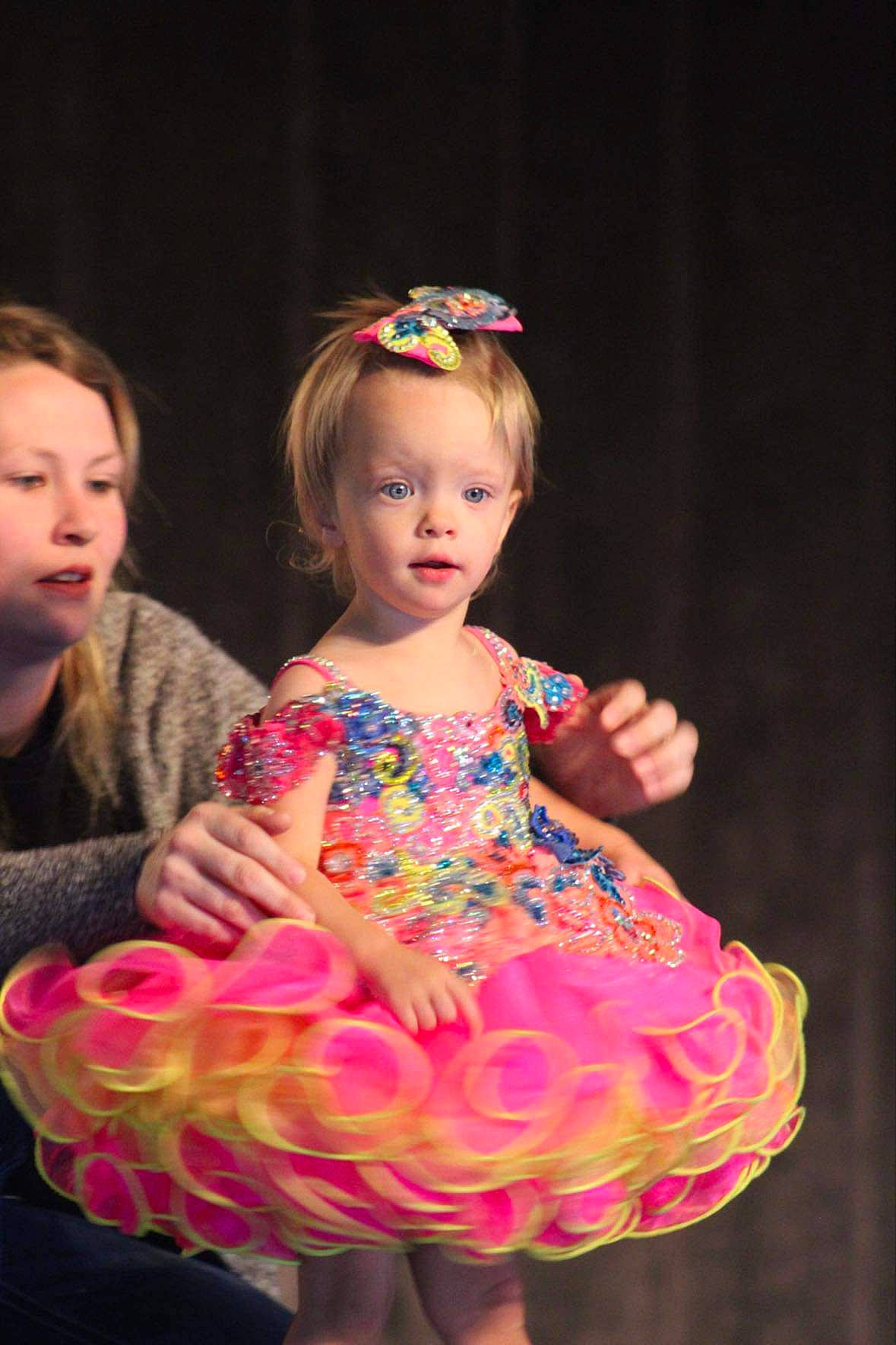 Aspen joined the competition — help win amazing prizes! baby_toddler_clothing, cheek, day_dress, dress, entertainment, event, eye, face, fashion_design, flash_photography, formal_wear, hair, happy, iris, magenta, one_piece_garment, performing_arts, person, pink, toddler