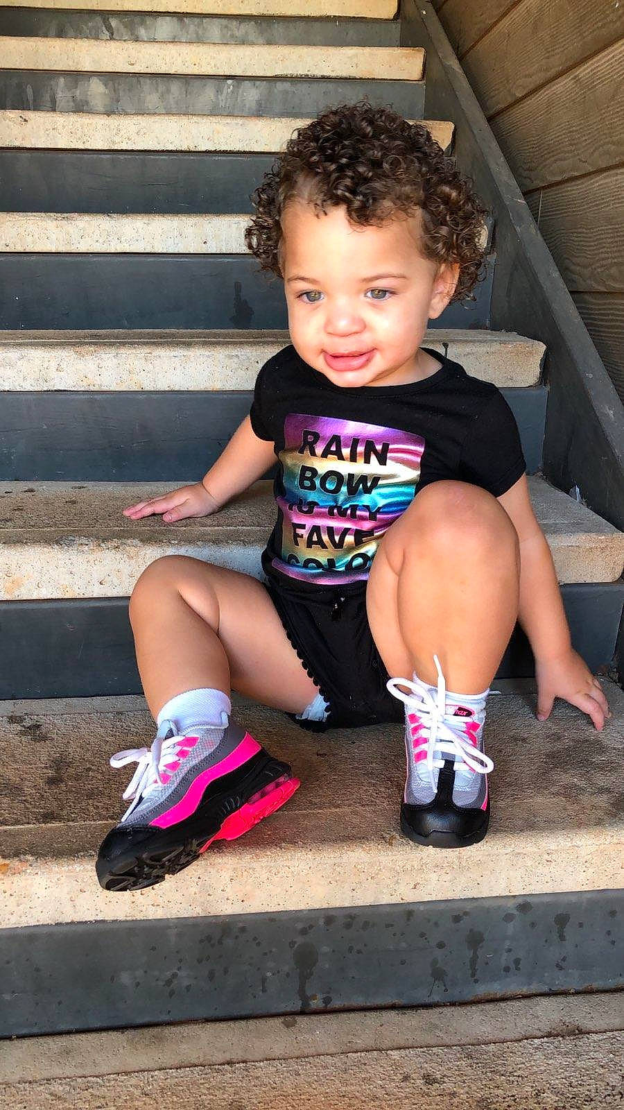 Penny is registered to the contest to win money with this photo: child, footwear, human_leg, knee, leg, person, pink, play, shoe, thigh, toddler