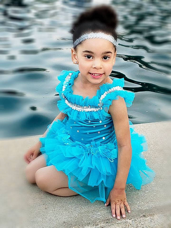 Taleigha joined the competition — help win amazing prizes! aqua, blue, child, child_model, clothing, costume, dress, face, fashion_accessory, hair_accessory, headwear, joy, person, photo_shoot, photography, ruffle, smile, textile, toddler, turquoise
