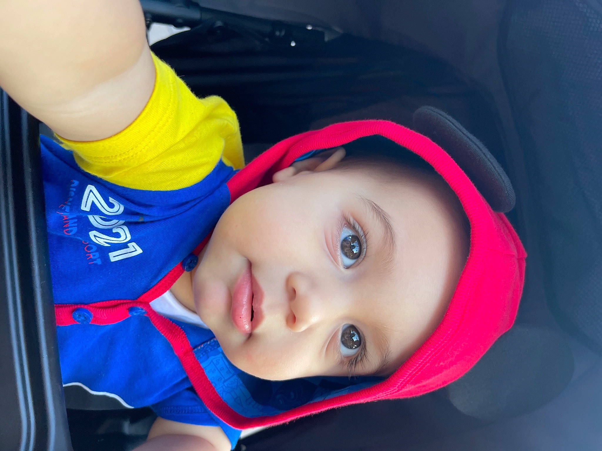 Ashter is registered to the contest to win money with this photo: auto_part, baby, baby_products, baby_toddler_clothing, cheek, child, cool, electric_blue, eyebrow, eyelash, fun, hat, headgear, headwear, lip, mouth, nose, outerwear, person, smile