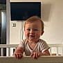 Mathys a rejoint le concours — aidez-le/la à gagner de superbes lots ! baby, child, crib, onesie, indoor, person, smiling, standing, furniture, face, hand, television, room, wall, candid, cute, home, light, expression, young