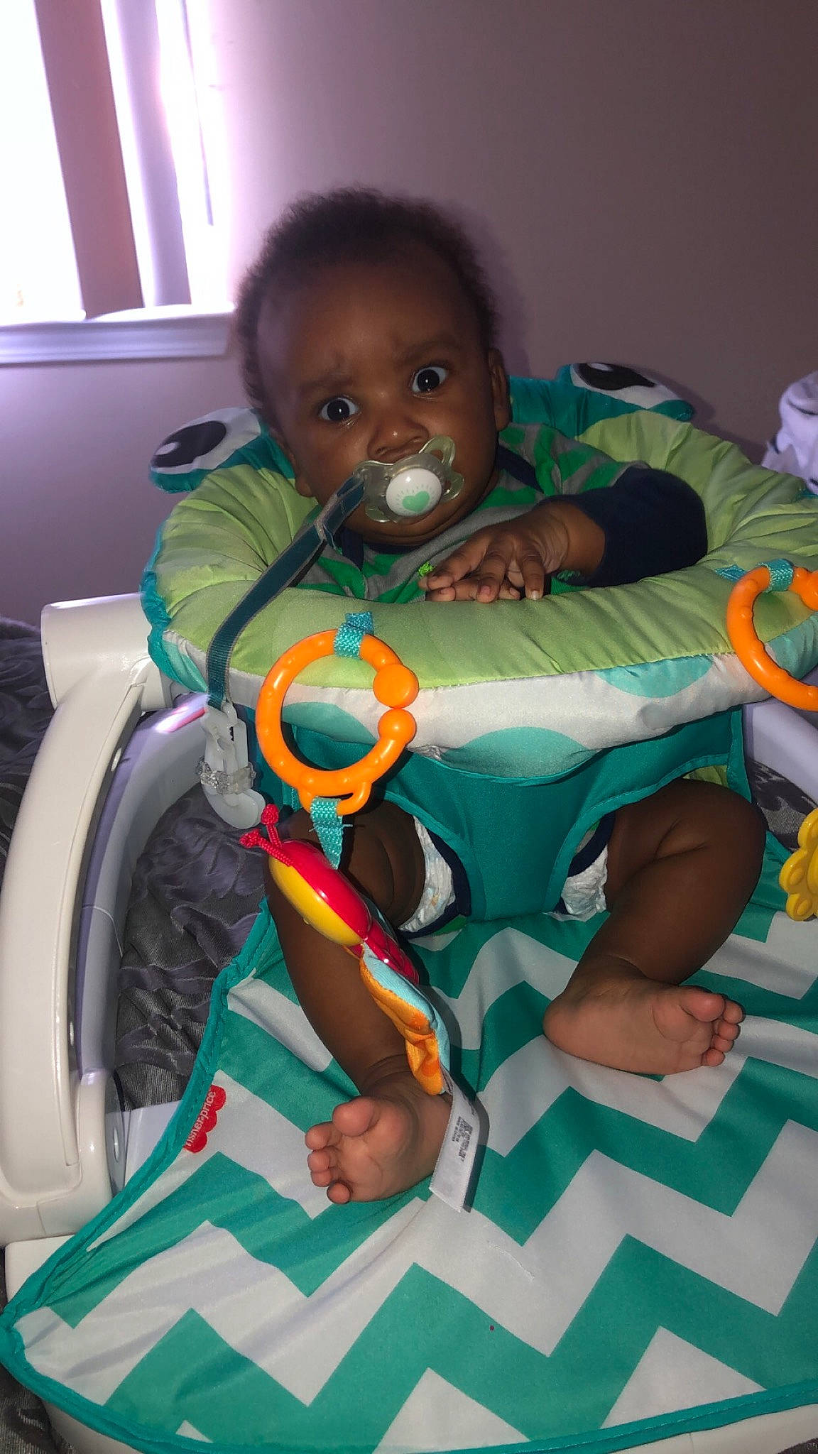Jamari joined the competition — help win amazing prizes! baby, baby_products, baby_safety, baby_toddler_clothing, car_seat, cheek, child, comfort, eye, finger, fun, green, iris, mouth, person, product, sitting, skin, steering_wheel, toddler