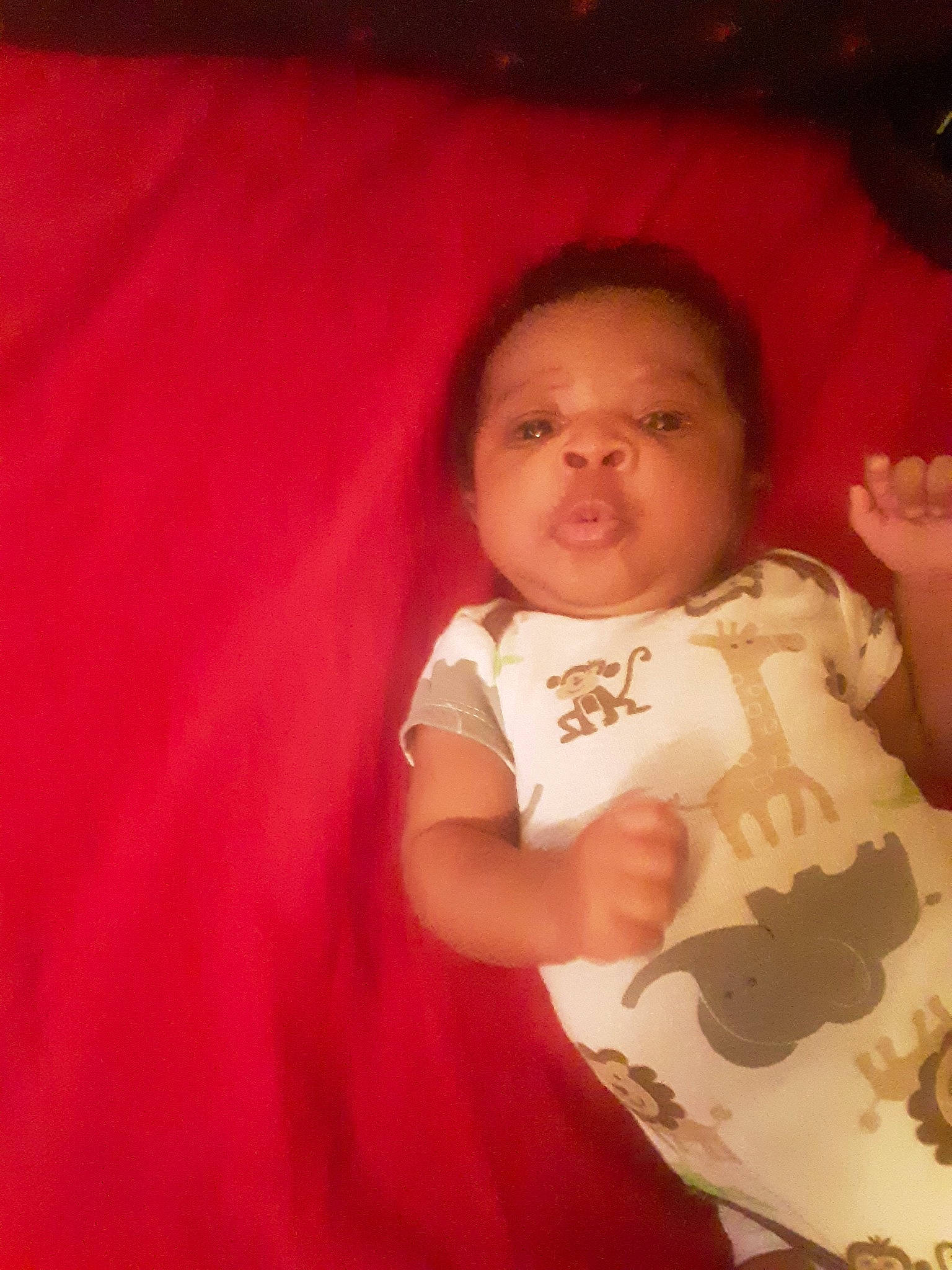 Daedae is registered to the contest to win money with this photo: arm, baby, cheek, child, eye, finger, fun, head, mouth, nose, person, red, skin, smile, thumb, toddler