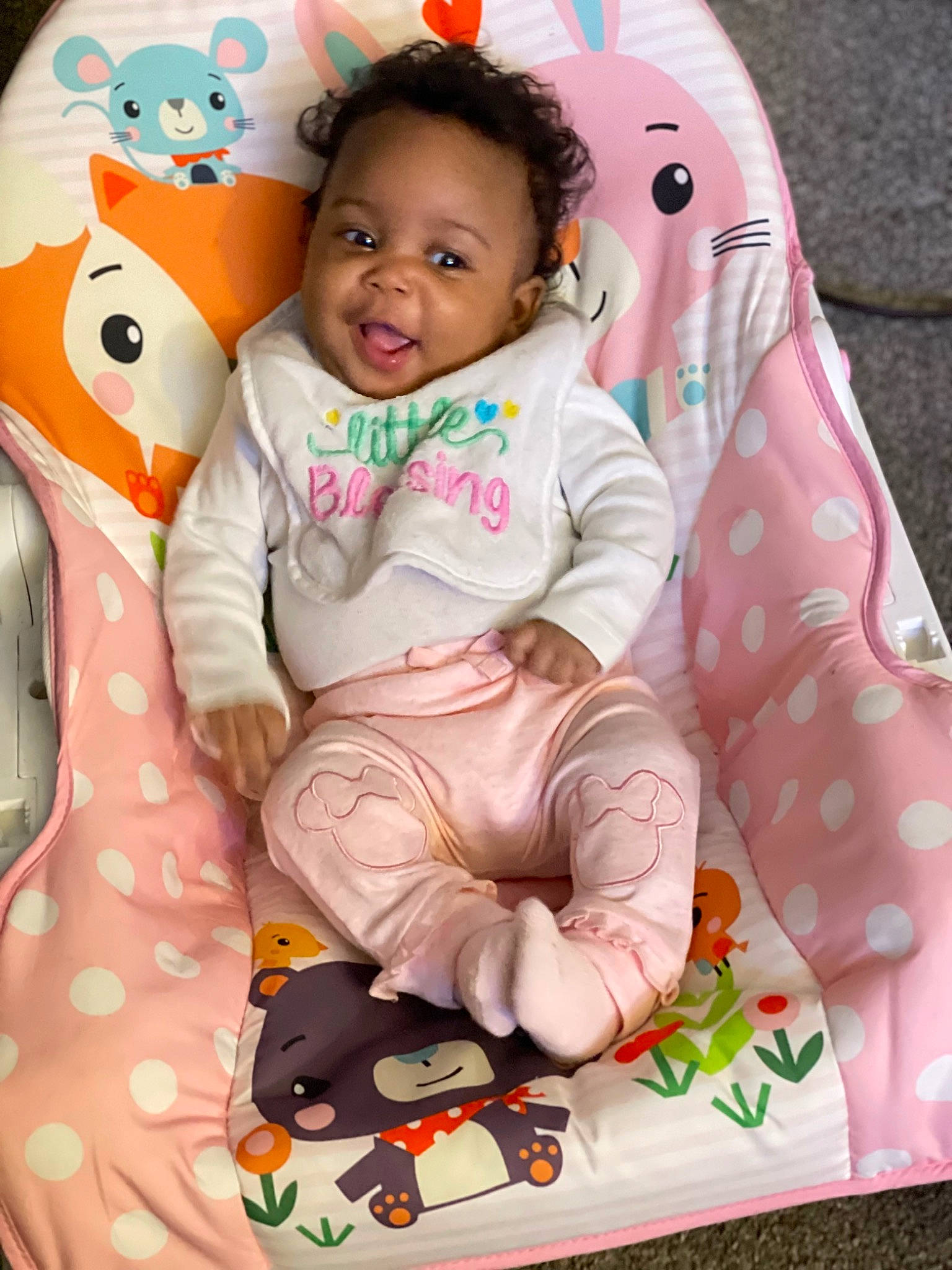 Ja Liyah is registered to the contest to win money with this photo: baby, baby_toddler_clothing, chair, cheek, child, comfort, eye, happy, head, magenta, outerwear, pattern, person, pink, product, sitting, skin, sleeve, smile, toddler
