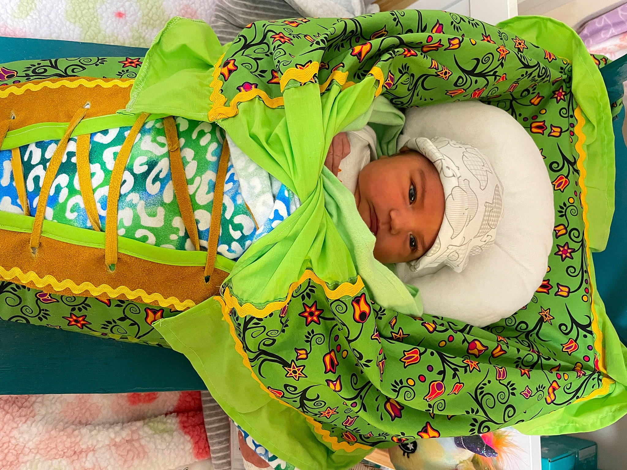 Emberly joined the competition — help win amazing prizes! art, baby, baby_products, baby_safety, baby_sleeping, baby_toddler_clothing, baby_toys, bedding, bedtime, blanket, child, comfort, green, headwear, infant_bed, linens, nap, pattern, person, room