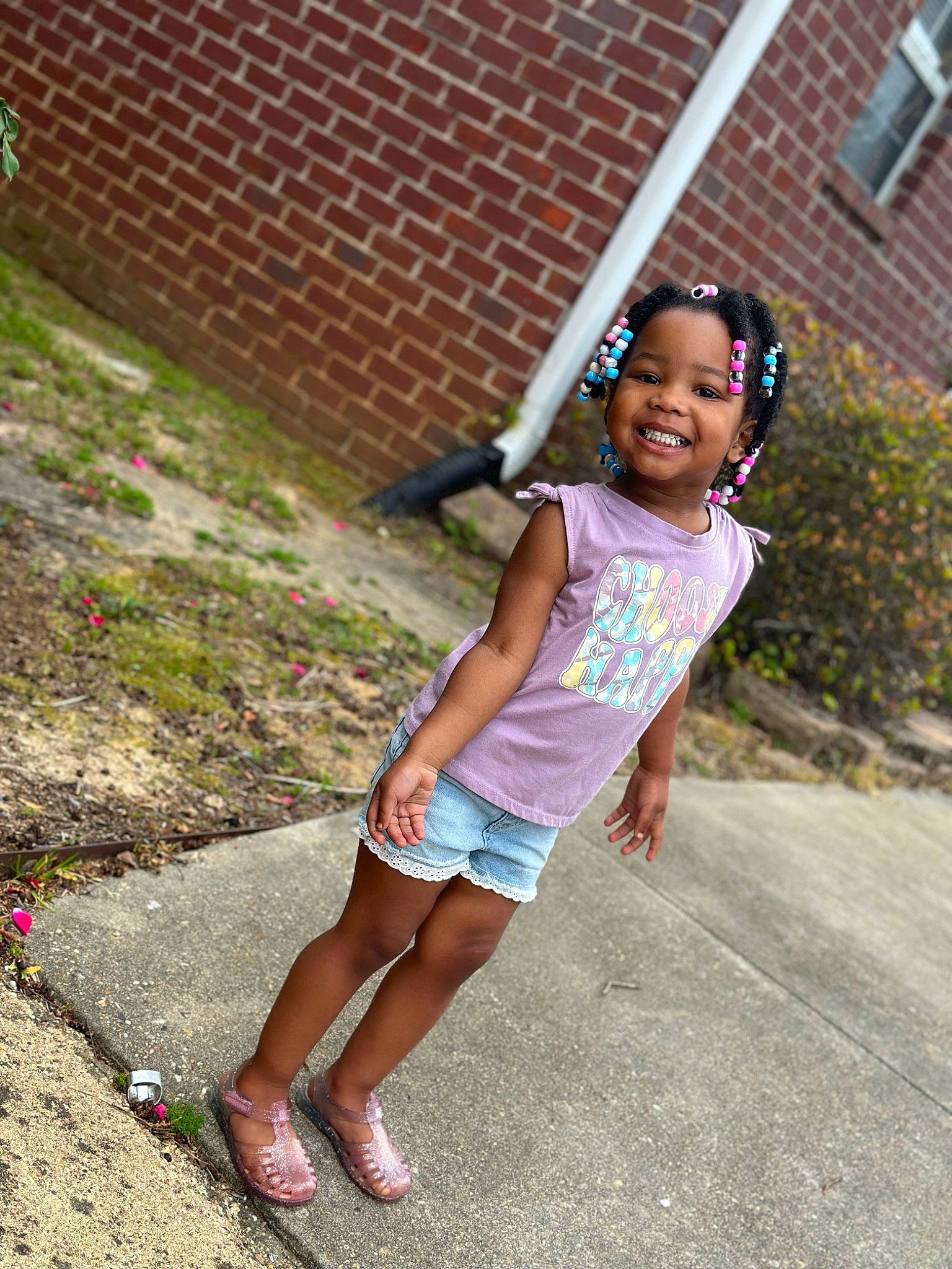 Shiloh joined the competition — help win amazing prizes! asphalt, child, cool, electric_blue, fun, grass, happy, headwear, joy, leisure, magenta, person, pink, plant, recreation, road, sandal, shorts, sidewalk, smile