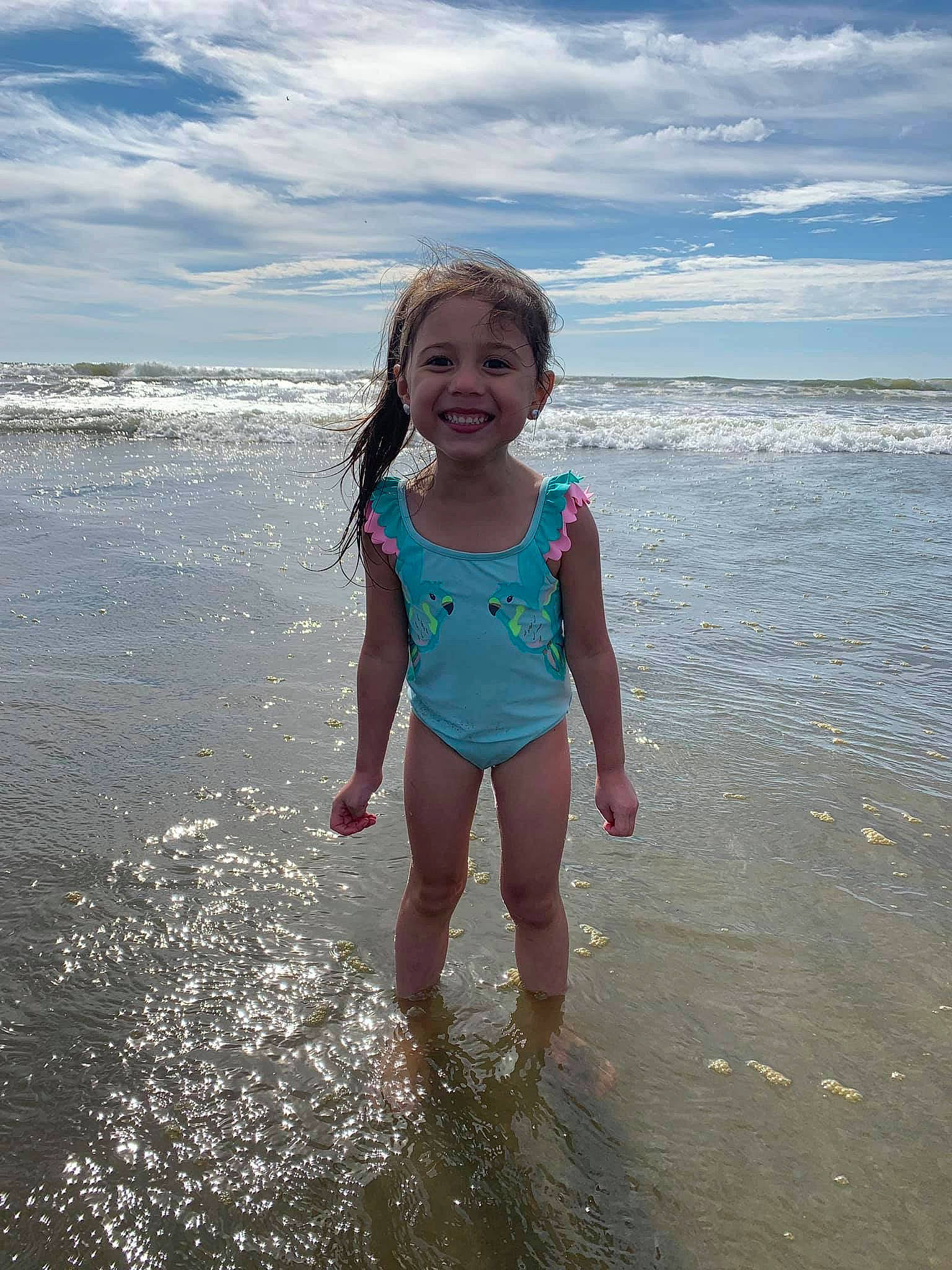 Eleyna is registered to the contest to win money with this photo: beach, child, coast, coastal_and_oceanic_landforms, fun, holiday, joy, ocean, person, play, sand, sea, shore, sky, smile, summer, tide, toddler, vacation, water