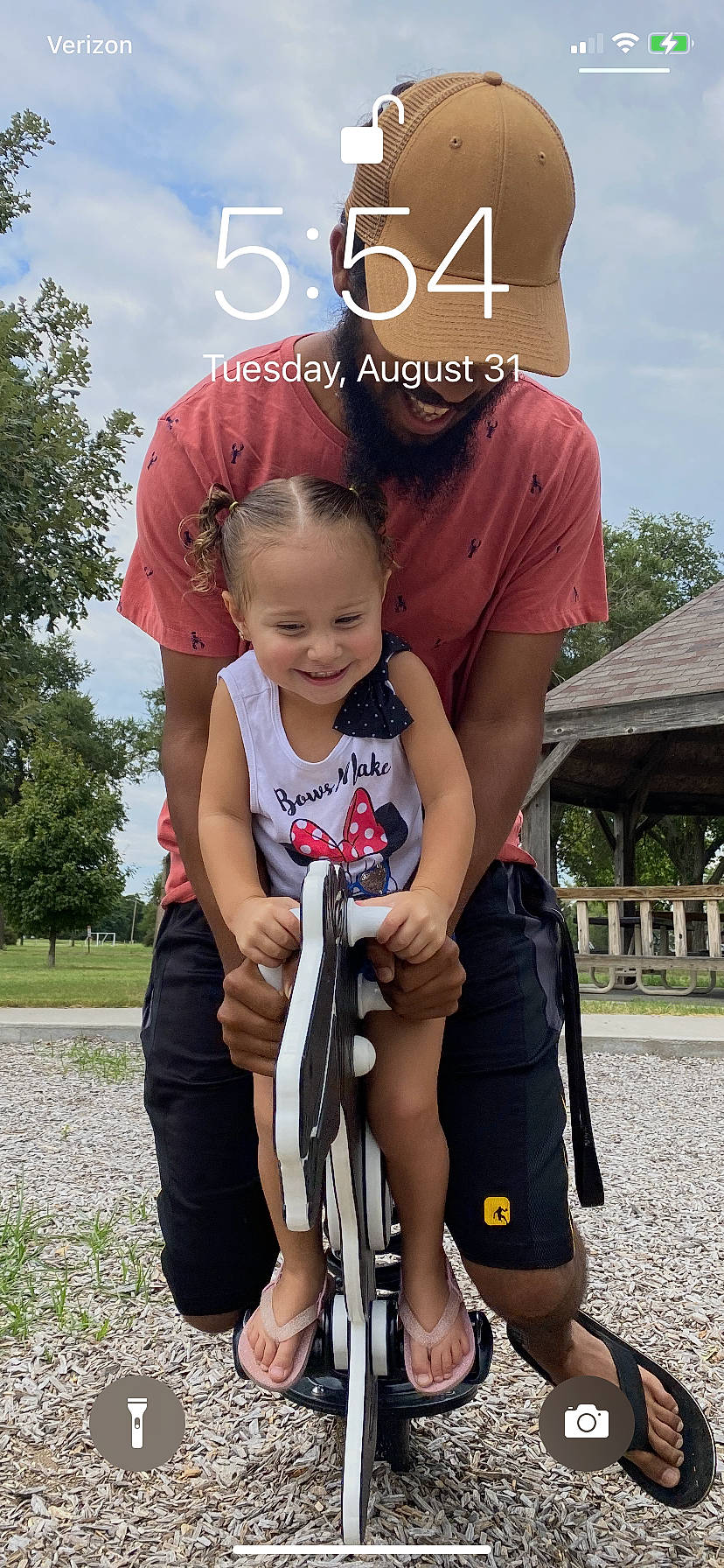 Amalia is registered to the contest to win money with this photo: community, cool, gesture, grass, happy, interaction, joy, leg, leisure, mammal, person, photograph, pink, plant, red, sky, sleeve, smile, summer, toddler