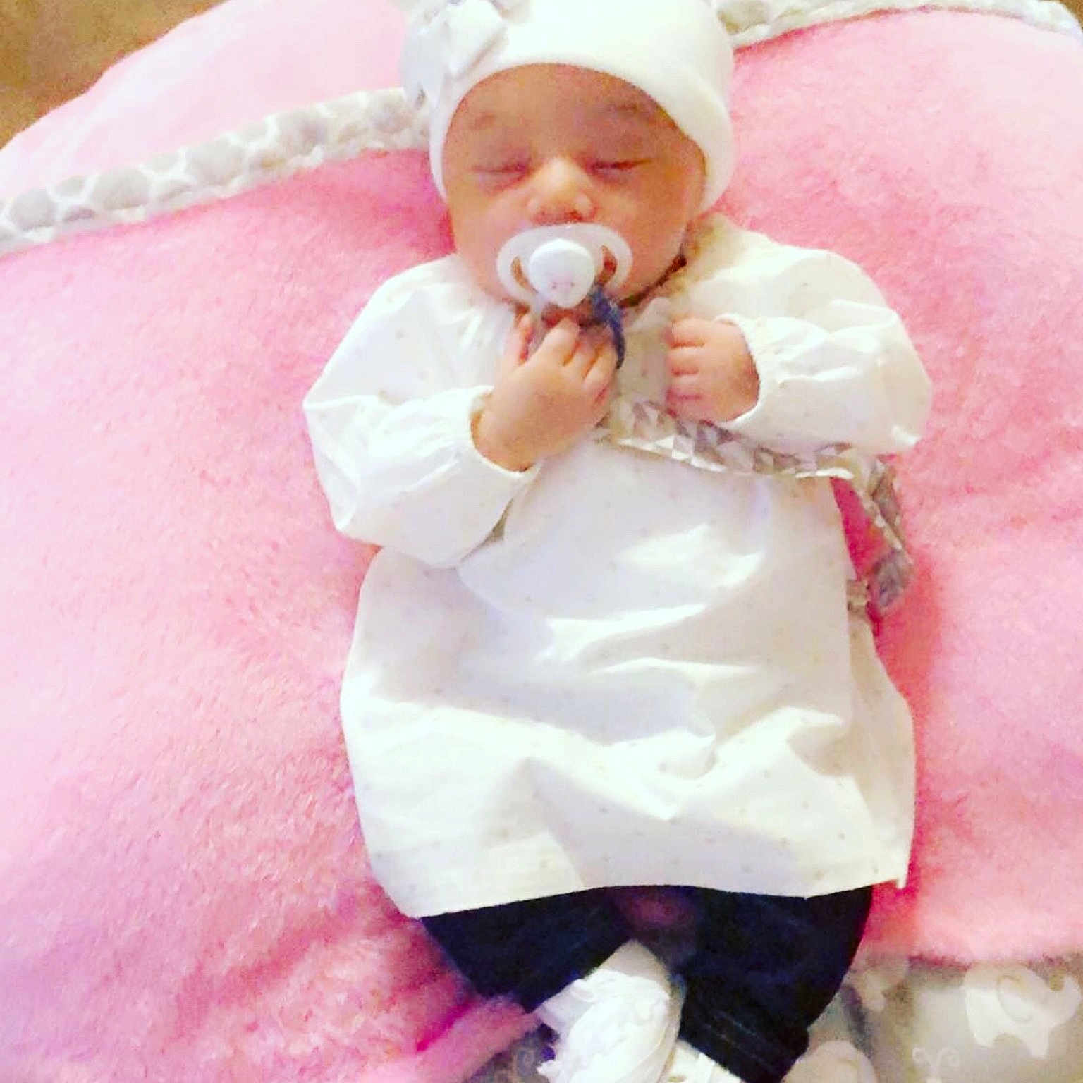Araina is registered to the contest to win money with this photo: child, ear, girl, hair_accessory, infant, petal, pink, product, skin, toddler, white