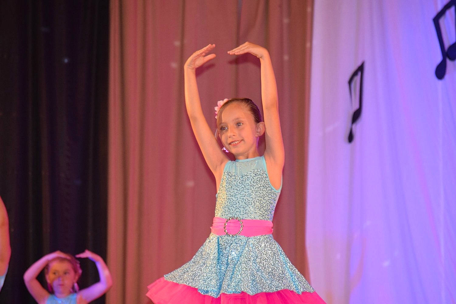 Lexy is registered to the contest to win money with this photo: child, choreography, dance, dancer, event, fun, joy, musical_theatre, performance, performance_art, performing_arts, person, pink, stage, talent_show