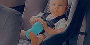 Justin is registered to the contest to win money with this photo: baby, car, car_interior, carseat, clothing, cushion, face, happy, head, homedecor, hosiery, machine, person, photography, portrait, sitting, sock, transportation, vehicle, wheel