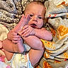 baby, diaper, foot, hand, blanket, pattern, skin, infant, cute, child, laying, comfort, toddler, expression, closeup, indoors, soft, cozy, cute_pose, person