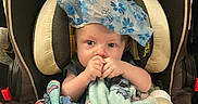 Jameson joined the competition — help win amazing prizes! baby, blanket, blue, bottle, car_seat, child, cloth, comfort, cozy, cute, expression, face, floral, holding, indoors, infant, person, seat, toy, young