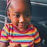 child, girl, portrait, colorful_clothing, striped_shirt, sunglasses, pink, braided_hair, indoor, curious, holding_object, dropper, smile, cute, young, person, fashion, closeup, happy, playful
