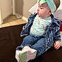 Mia joined the competition — help win amazing prizes! baby, child, denim_jacket, denim_jeans, headband, bow, sitting, shoes, unicorn, graphic_tee, indoor, floor, cute, portrait, clothing, person, infant, casual_wear, footwear, fashion
