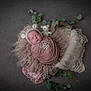 newborn, baby, sleeping, wrapped, blanket, hat, bear_ears, curly_wool, flowers, greenery, cozy, soft, pink, cute, portrait, infant, peaceful, cute_hat, resting, studio