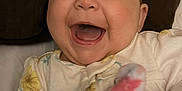 Hailey is registered to the contest to win money with this photo: baby, babylaughing, bodypart, clothing, couch, cushion, face, finger, hand, happy, hat, head, homedecor, laughing, mouth, newborn, person, photography, portrait, smile