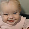 Rosemary is registered to the contest to win money with this photo: baby, child, smiling, pink_clothing, blonde_hair, blue_eyes, closeup, happy, infant, cute, portrait, person, skin, face, hand, sitting, indoors, young_child, toddler, expression