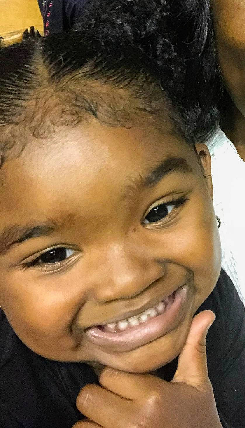 Taylen is registered to the contest to win money with this photo: black_hair, cheek, child, chin, close_up, ear, eyebrow, face, facial_expression, forehead, hair, hairstyle, head, jaw, joy, lip, mouth, nose, person, skin