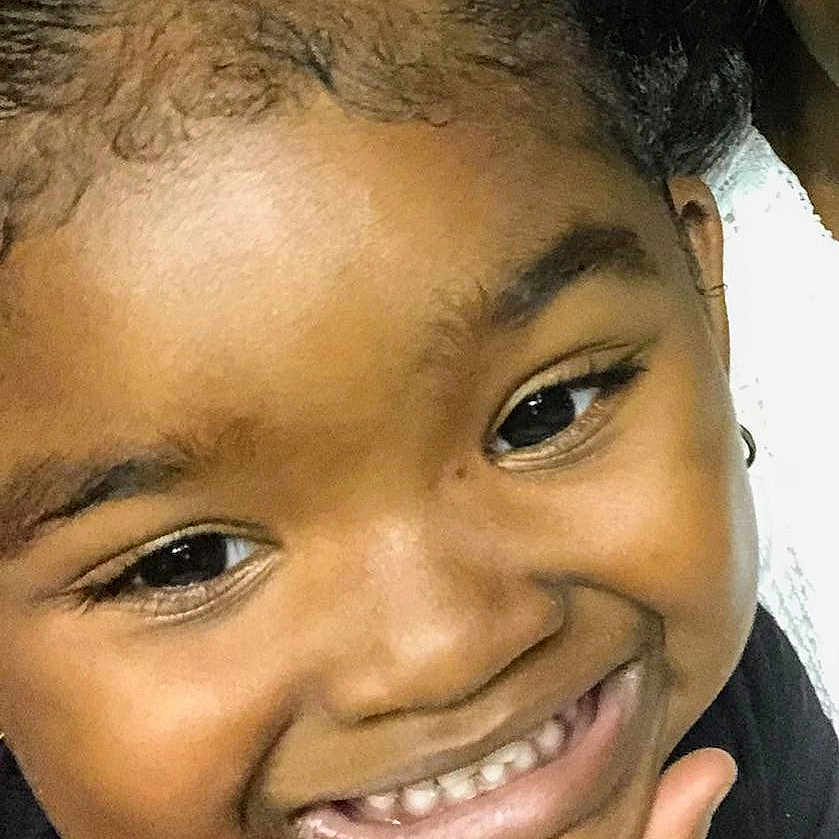 Taylen is registered to the contest to win money with this photo: black_hair, cheek, child, chin, close_up, ear, eyebrow, face, facial_expression, forehead, hair, hairstyle, head, jaw, joy, lip, mouth, nose, person, skin