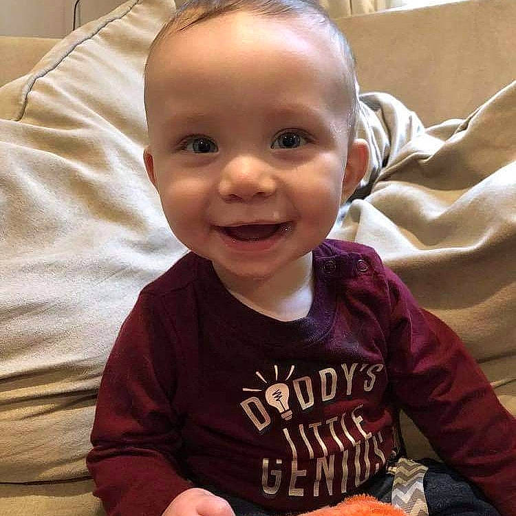 Dax joined the competition — help win amazing prizes! baby, baby_laughing, baby_toddler_clothing, cheek, child, eyebrow, facial_expression, finger, forehead, hand, happy, iris, joy, laugh, linens, mouth, person, sitting, sleeve, smile