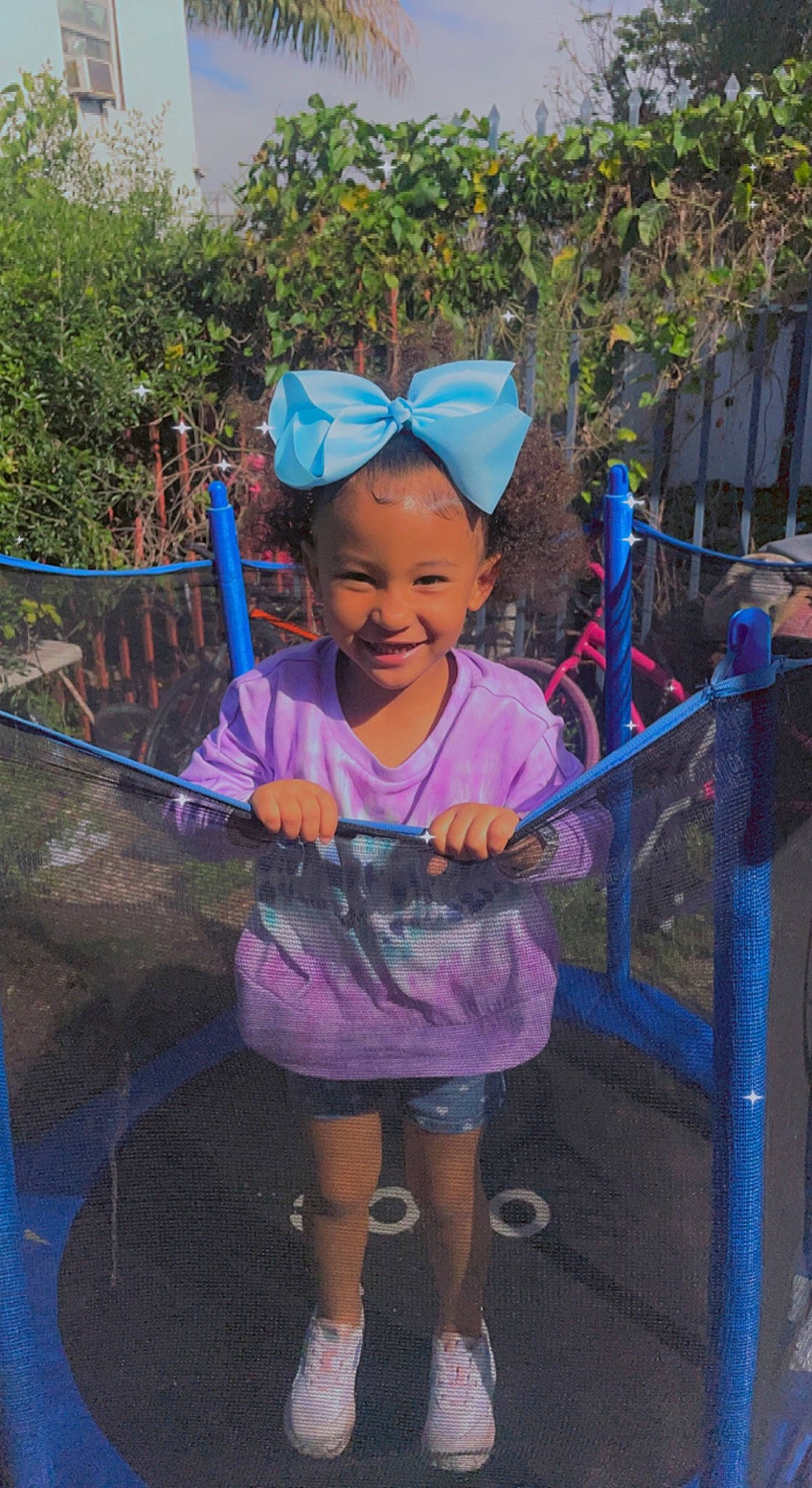 Sahara is registered to the contest to win money with this photo: cap, child, city, electric_blue, event, fun, grass, happy, hat, joy, leaf, leisure, magenta, person, pink, play, purple, recreation, sandal, smile