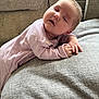 baby, child, comfort, couch, cozy, cushion, face, furniture, hand, head, indoors, infant, peaceful, pink_onesie, portrait, relaxed, resting, skin, sleeping, soft_fabric