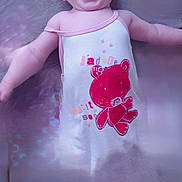 Flora participe au concours pour gagner de l'argent avec cette photo : baby, child, smiling, happy, teddy_bear, dress, clothing, infant, portrait, cute, person, face, laughing, lying_down, pink, white, red, background, texture, indoors