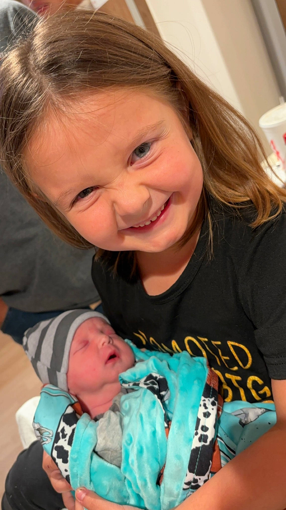 Presley is registered to the contest to win money with this photo: baby, baby_toddler_clothing, cheek, child, eye, face, facial_expression, fun, gesture, happy, head, headwear, iris, joy, mouth, nose, organ, people, person, skin