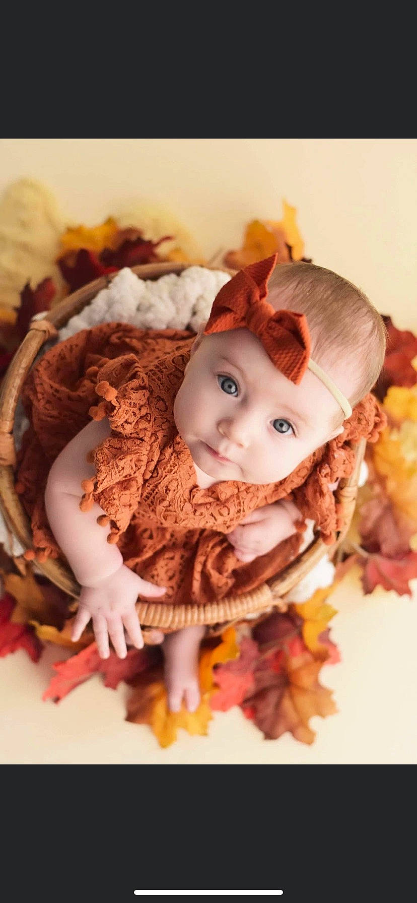 Emmalyn is registered to the contest to win money with this photo: baby, baby_toddler_clothing, brown_hair, child, cut_flowers, doll, dress, eye, eyelash, fashion_accessory, hair_accessory, happy, headband, headgear, headpiece, iris, peach, person, petal, toy
