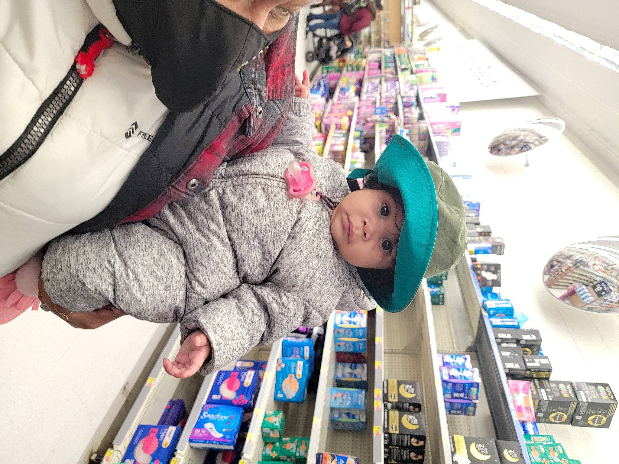 Lailah joined the competition — help win amazing prizes! baby, child, collection, convenience_store, customer, fun, headwear, person, personal_protective_equipment, play, publication, retail, room, service, shelf, toddler