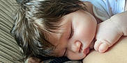 Alaina is registered to the contest to win money with this photo: baby, sleeping, closeup, face, hand, infant, skin, hair, peaceful, rest, newborn, child, cute, portrait, soft, natural_light, cozy, relaxation, toddler, candid
